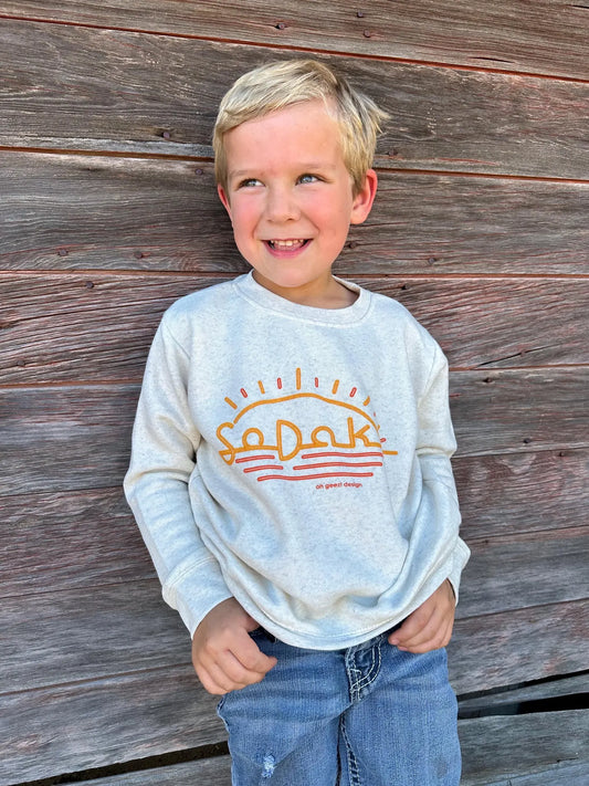 SoDak Neon Sun Kids' Crewneck Sweatshirt by Oh Geez! Design