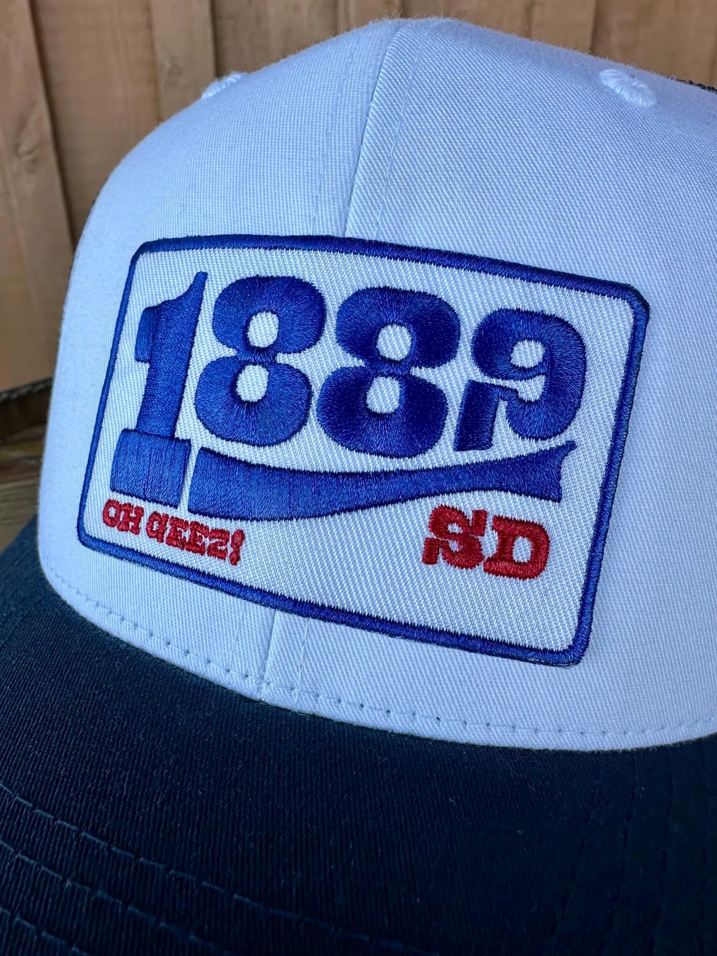1889 South Dakota Navy and White Trucker Hat