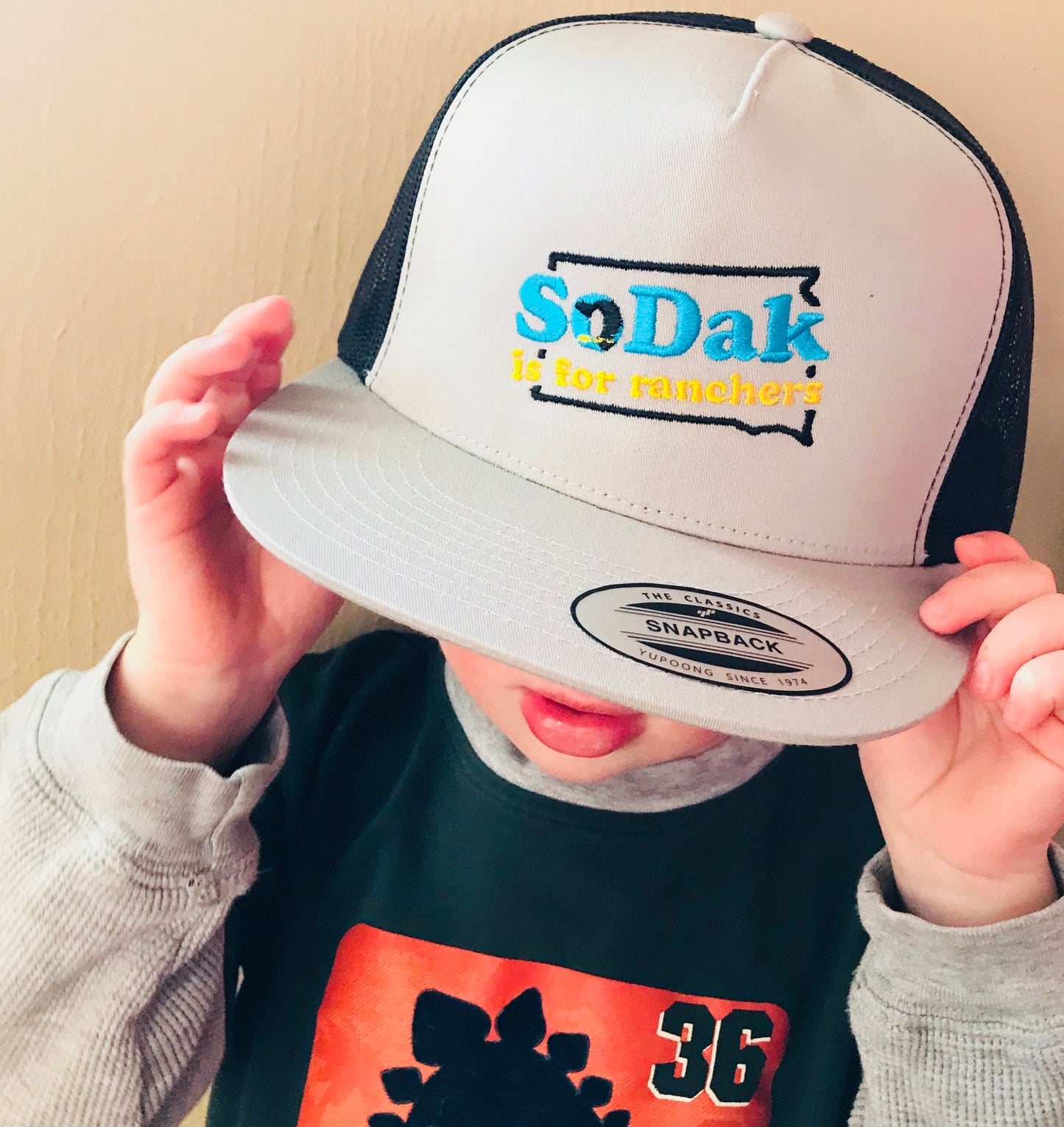 SoDak is for Ranchers Embroidered Gray and Black Flatbill Cap