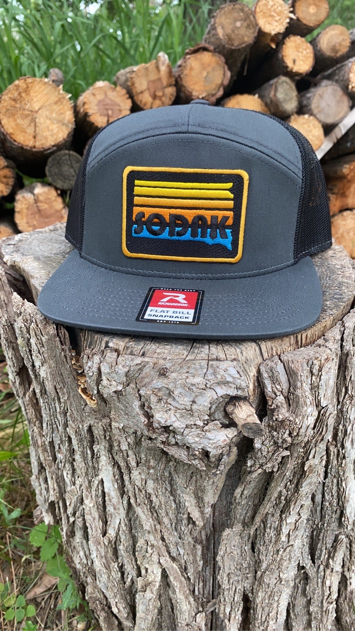 SoDak Sunset Charcoal and Black Flatbill Seven-Panel Cap