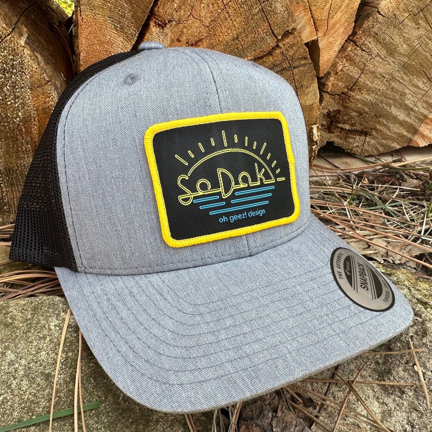 SoDak Neon Sun Trucker Cap by Oh Geez! Design