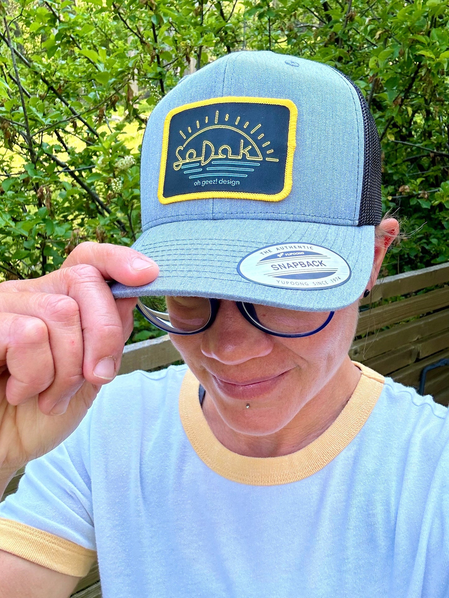 SoDak Neon Sun Trucker Cap by Oh Geez! Design