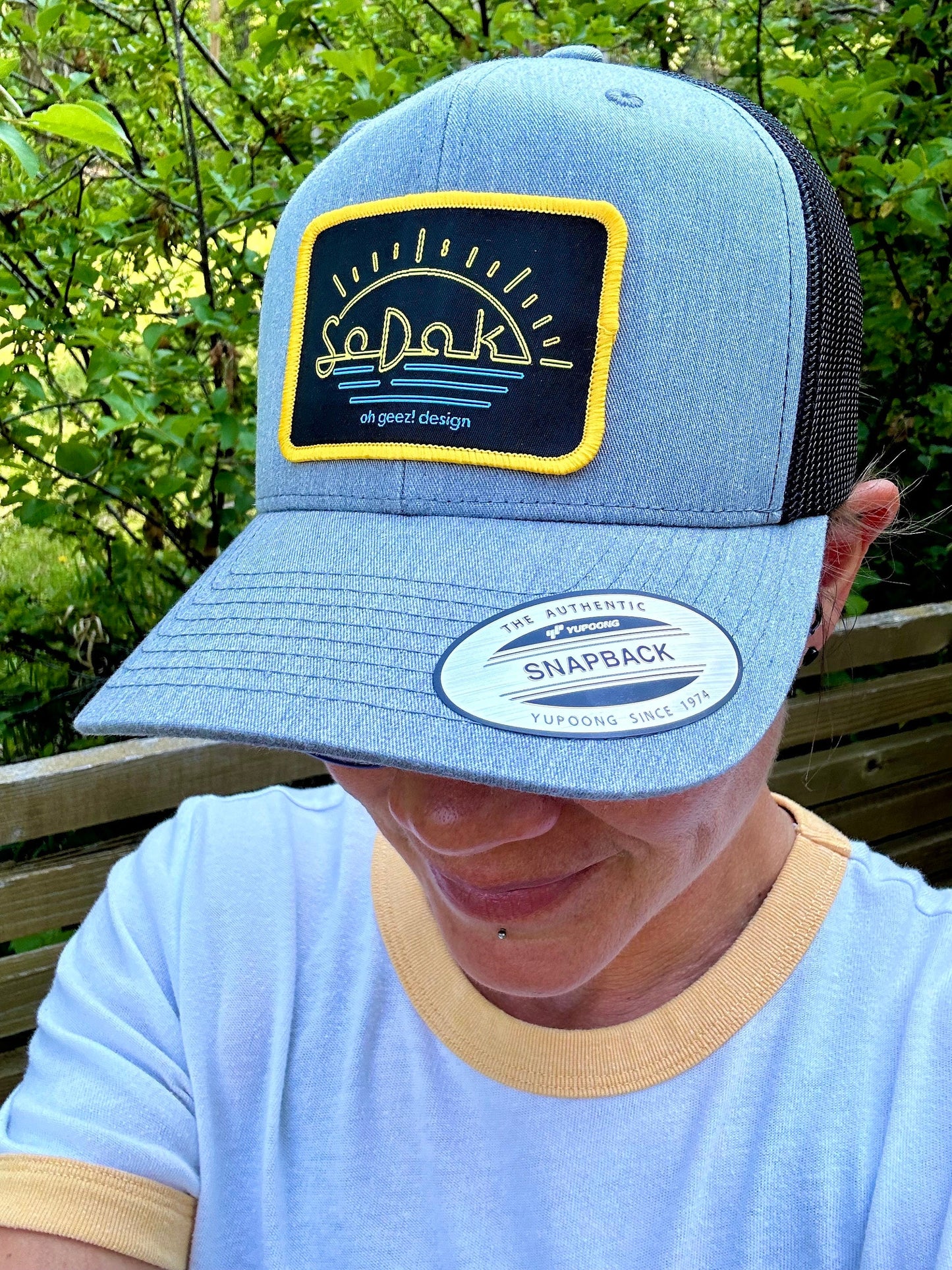 SoDak Neon Sun Trucker Cap by Oh Geez! Design