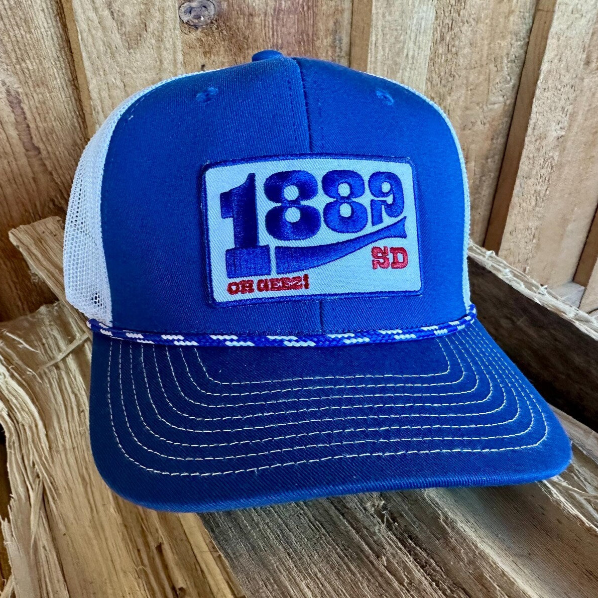 1889 South Dakota Rope Trucker Hat Blue and White