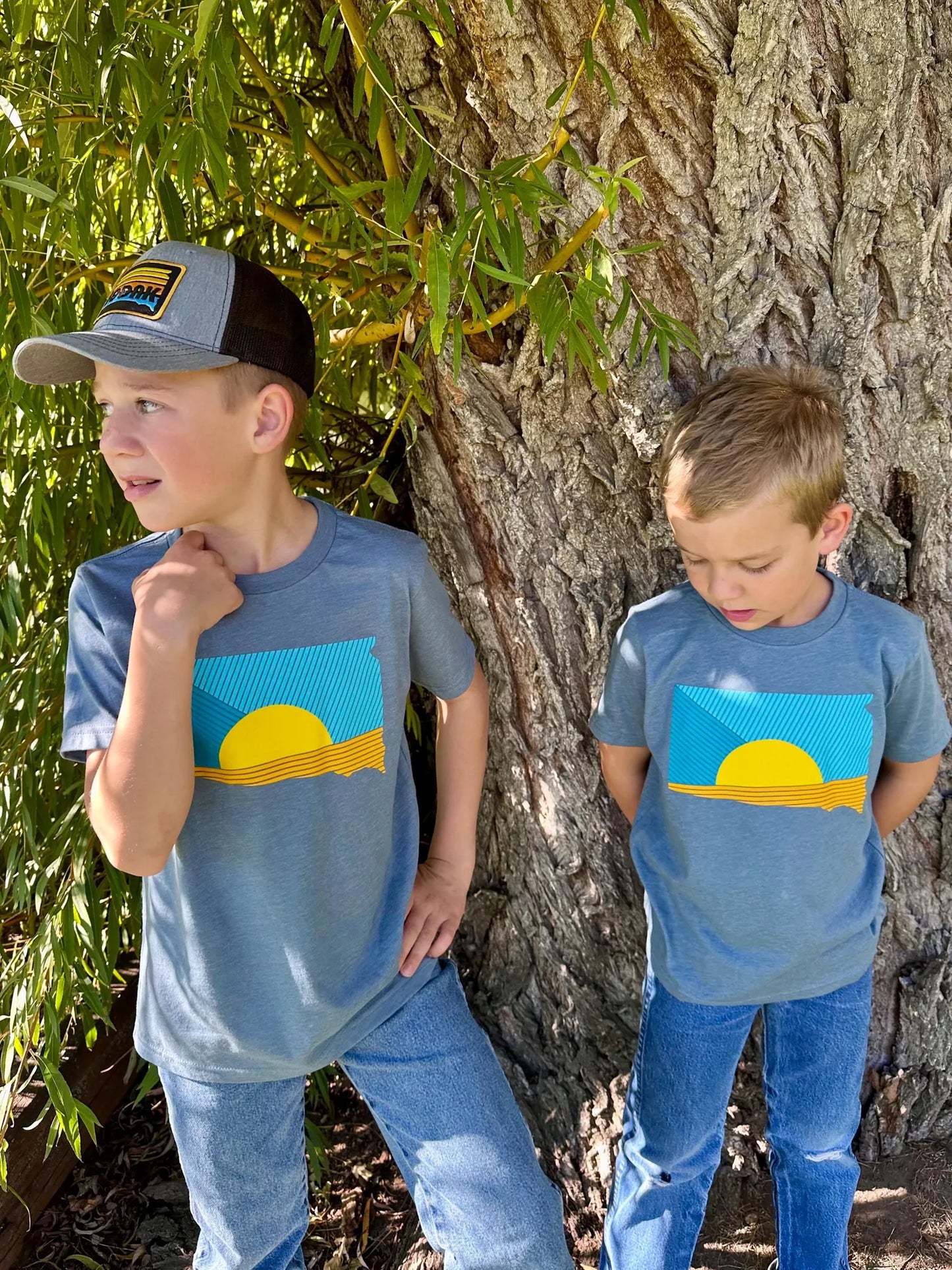South Dakota Sunrays Kids T-shirt by Oh Geez! Design