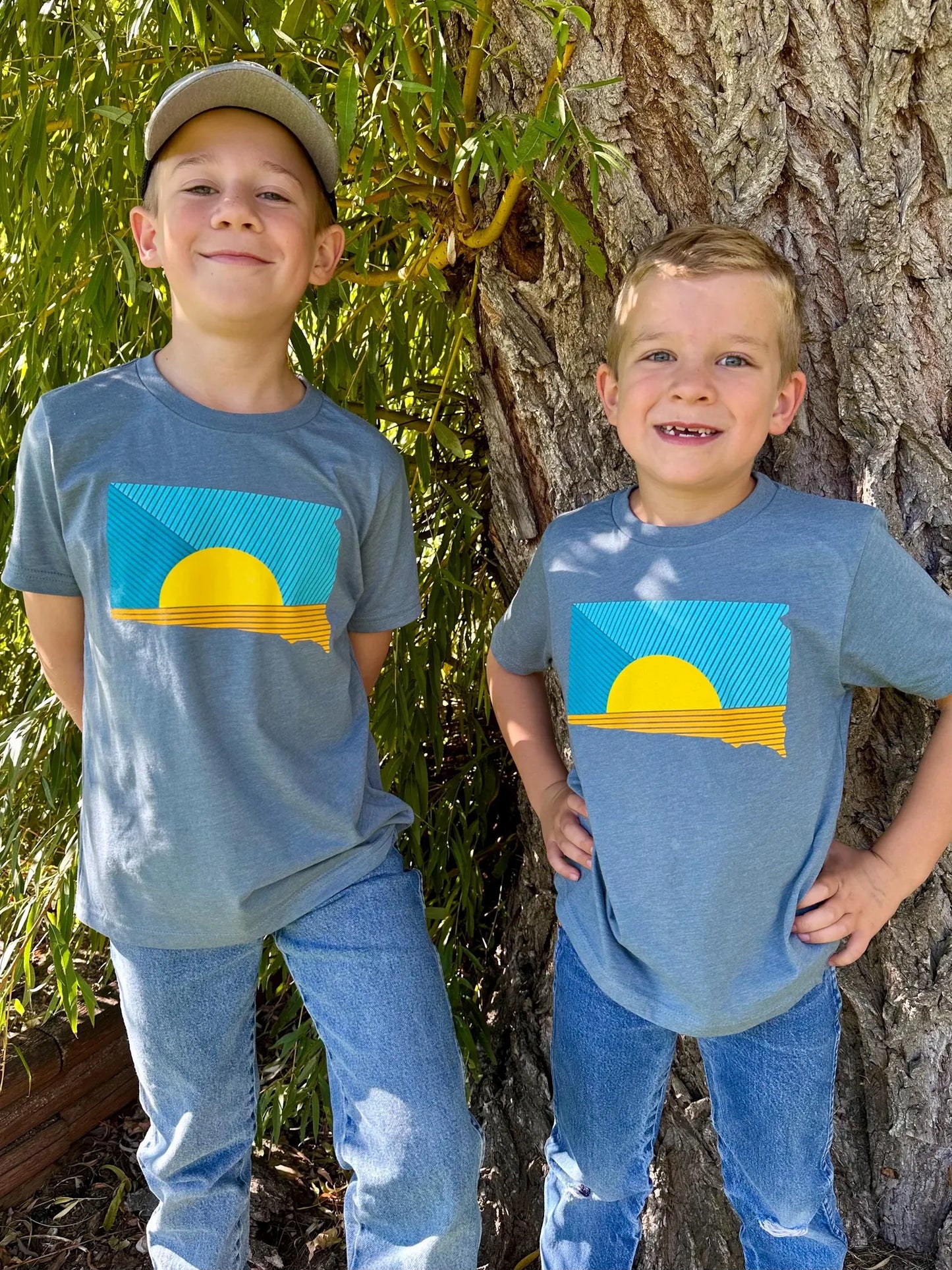 South Dakota Sunrays Kids T-shirt by Oh Geez! Design